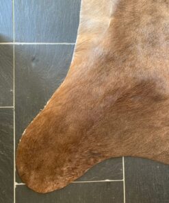 Kuhfell nussbraun uni gestromert