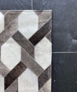 Mosaikteppich aus Kuhfell