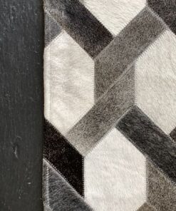 Mosaikteppich aus Kuhfell