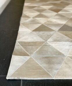 Mosaikteppich aus Kuhfell