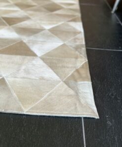 Mosaikteppich aus Kuhfell