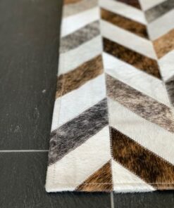 Mosaikteppich aus Kuhfell